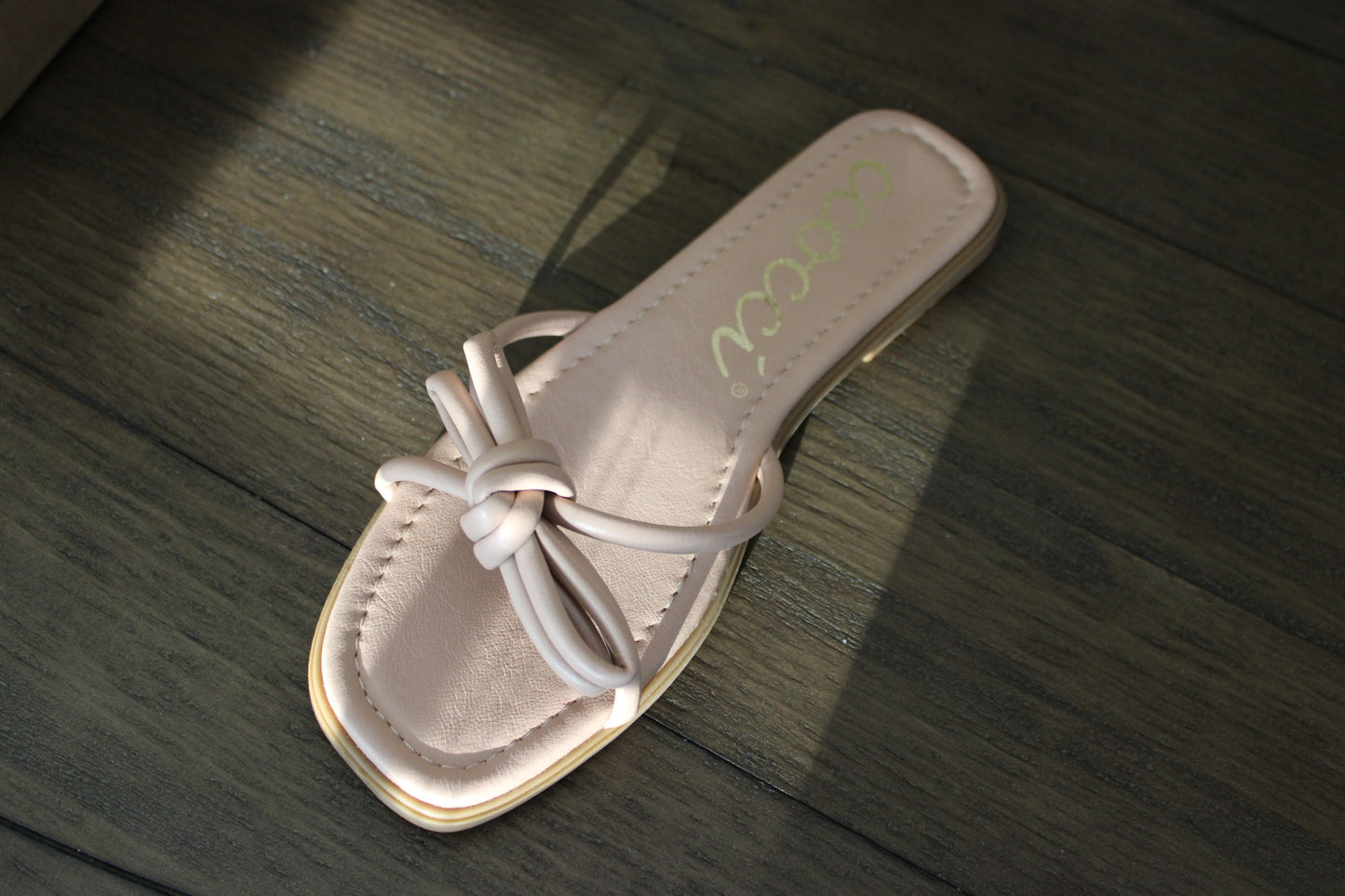 Knotted bow slip on sandal