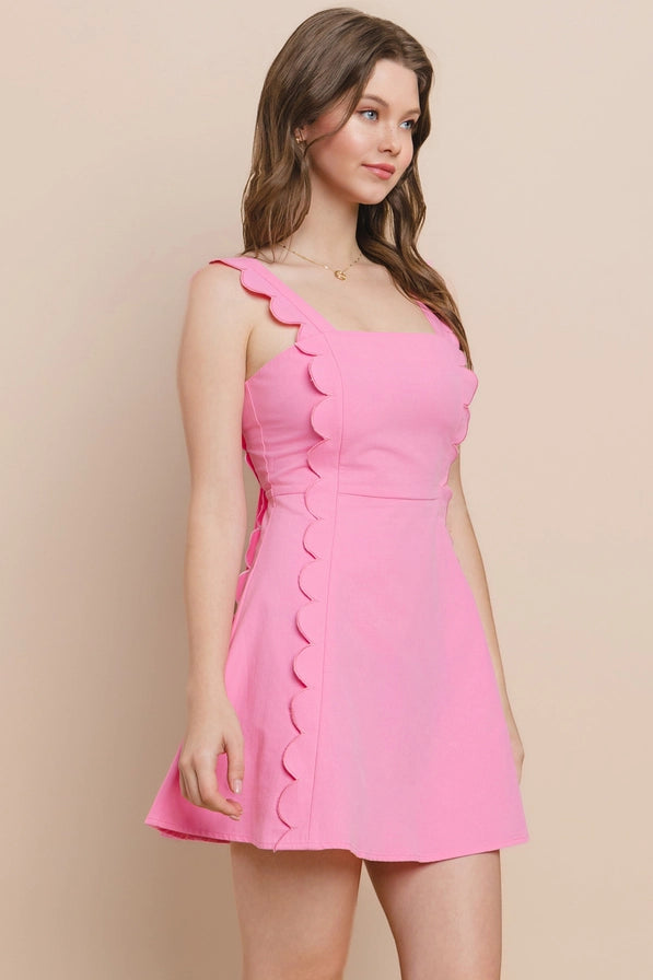 Pink scalloped bow dress