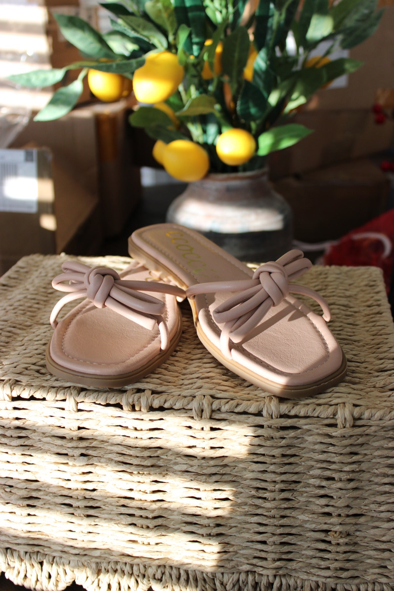 Knotted bow slip on sandal