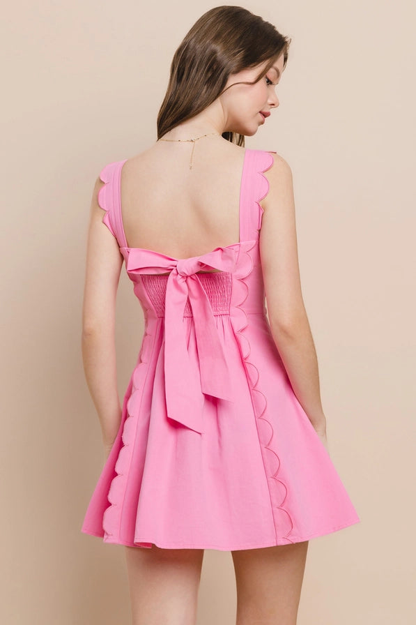 Pink scalloped bow dress